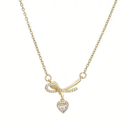 Collar de Acero Bañado en Oro 18K · Lazo de Corazón